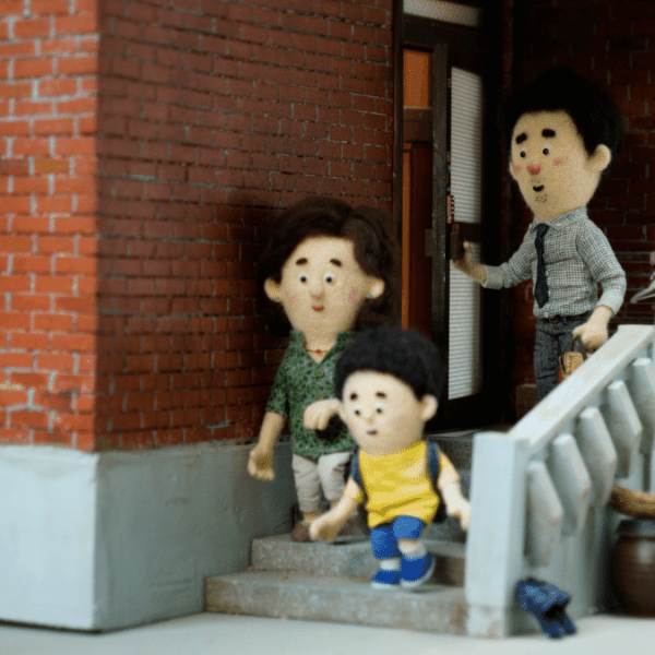 an felt puppet family leaves their home