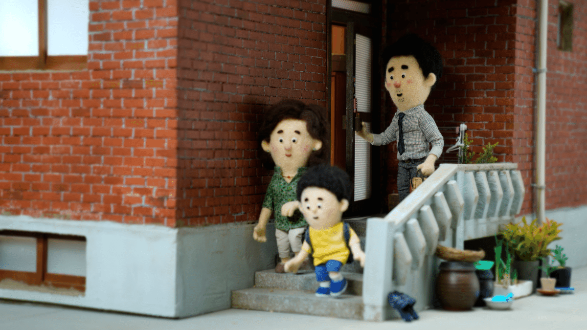 an felt puppet family leaves their home