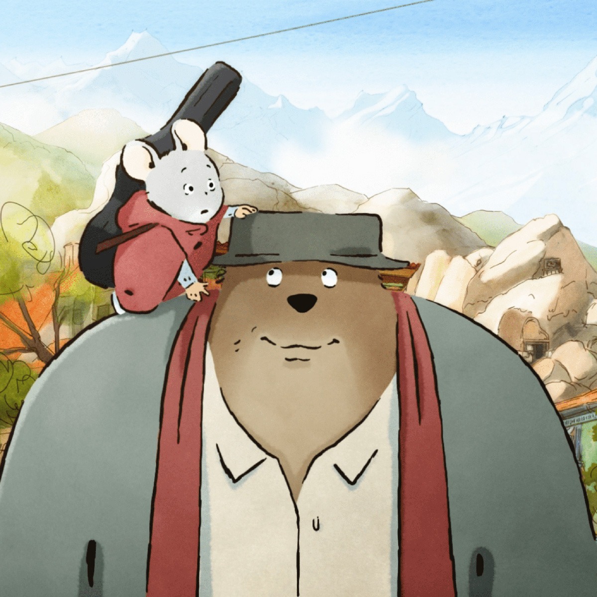 a mouse wearing a red poncho and a guitar case around his back stands on the shoulder of a bear wearing a hat and clothes.