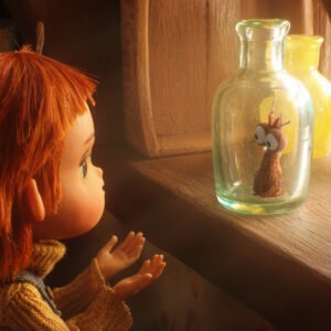A child looking at a small creature trapped in a bottle.